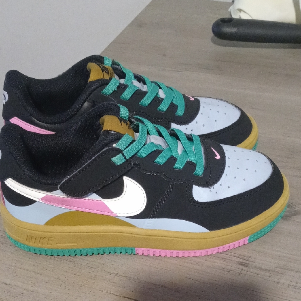 Nike Black and Gold Sneakers with Pink and Green Accents